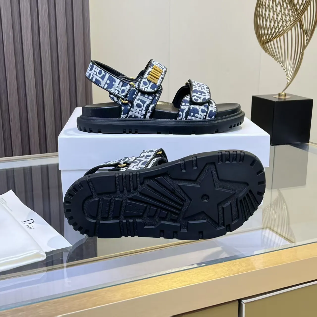 👟👟Ex-factory price 480👟👟 Dior classic popular sandals Step into the fashion territory of Dior slippers and encounter the ultimate fusion of elegance and comfort. The upper is engraved with the Christian Dior Paris logo using exquisite embroidery technology. The delicate stitching tells the brand's profound heritage and is fully recognizable.   Made of high-quality materials, it feels soft and fits your feet, as if it is a gentle care tailor-made for your feet. The sole is carefully designed and engraved with Christian Dior's lucky star symbol. It is not only a beautiful embellishment, but also provides reliable grip, making every step steady and secure.   It has a simple design and is easy to put on and take off. Whether it is a lazy weekend or a pleasant vacation, it can be easily adapted. Whether paired with casual shorts, casual jeans, or an elegant dress, Dior slippers can instantly enhance the overall style and show a casual fashion attitude.   Dior slippers, in the name of fashion, inject luxurious charm into your life and accompany you with every step you take with confidence and elegance. Material: Fine genuine cowhide upper, outsole, TPR, non-slip and wear-resistant, code number: 35-41 (42 customized)